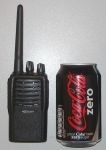 Photo of PT4200 radio next to drink can to show size