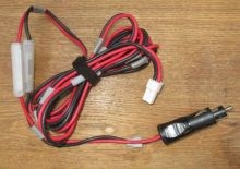 Vehicle radios power lead plugs in to cigarette lighter socket